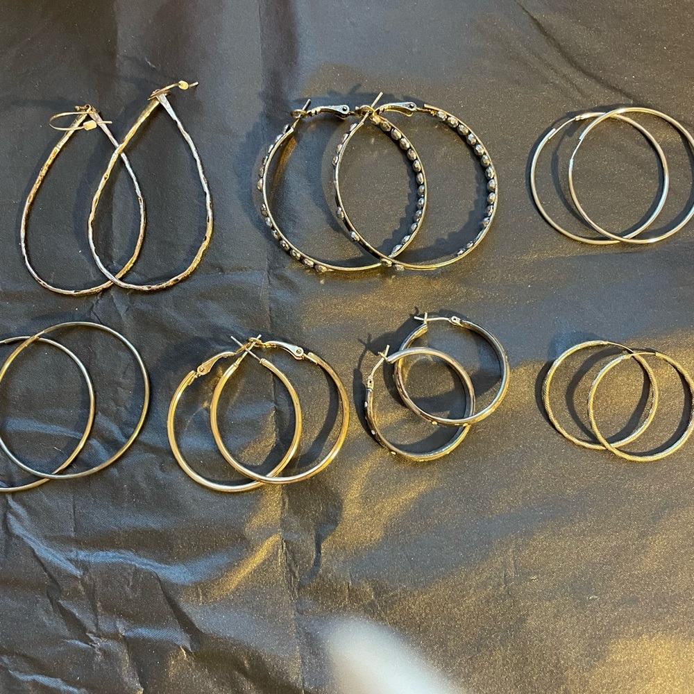 Elegant Silver Hoop Earrings Set
Various sizes